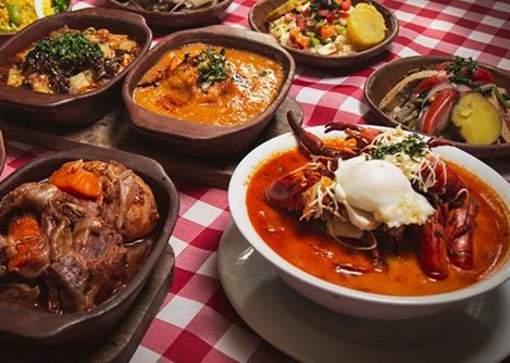 Bowls of food at a picantería, traditional restaurants that serve typical Arequipan food.