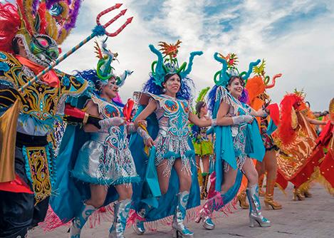 Dancers wearing colorful and festive costumes for the Candelaria festival in Puno.