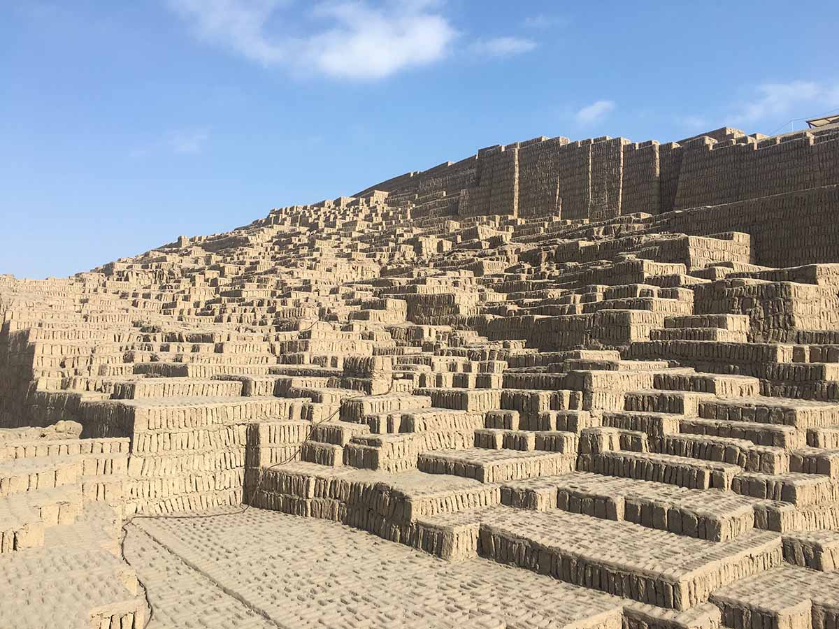 The adobe and clay brick walls of urban Lima's most famous archaeological site, Huaca Pucllana.