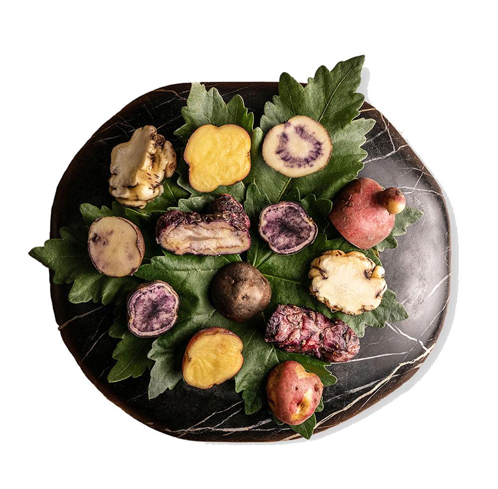 Collage showing Machu Picchu, several Peruvian dishes, and a traveler taking a photo.